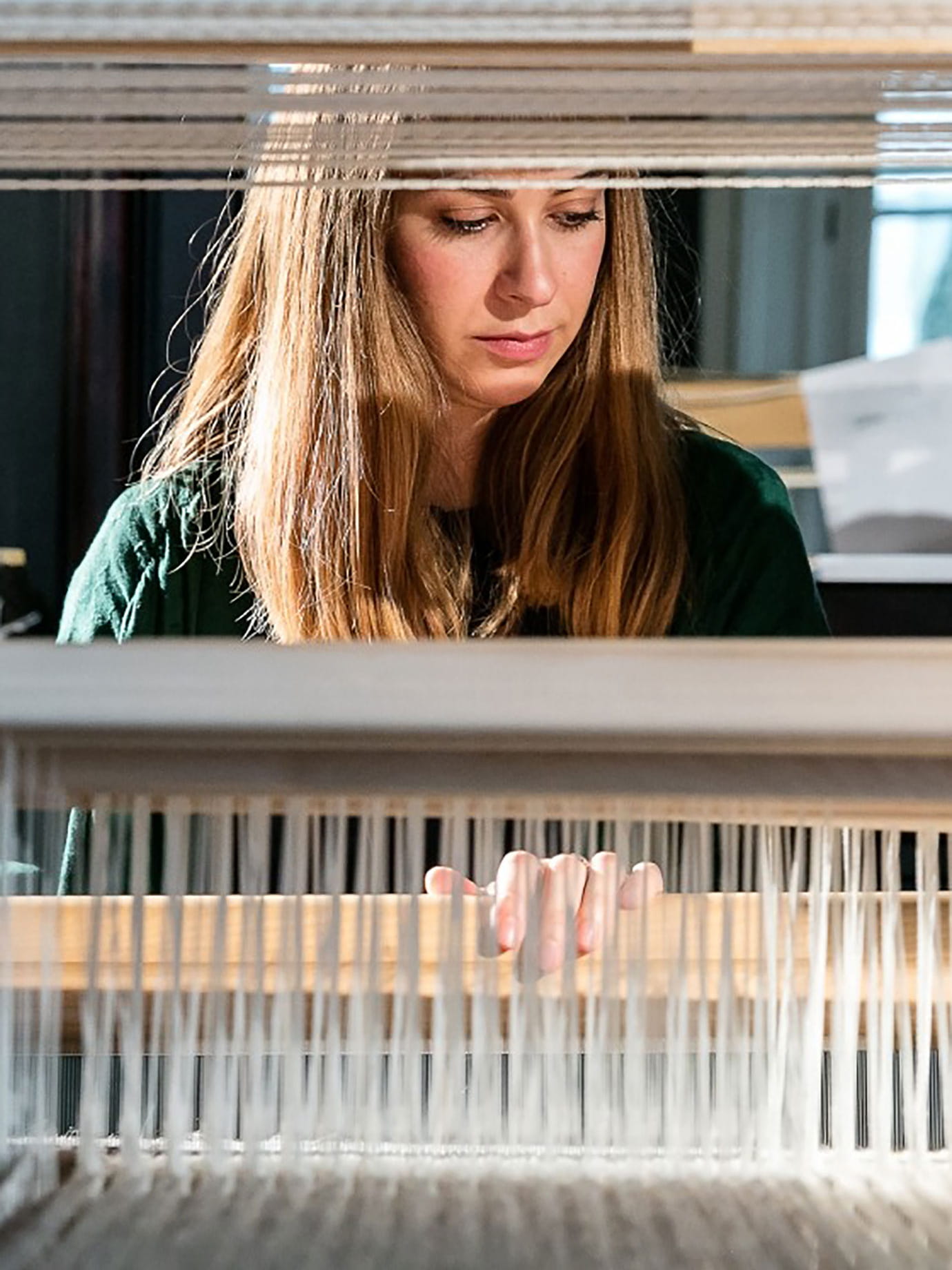 woman working at a loom
