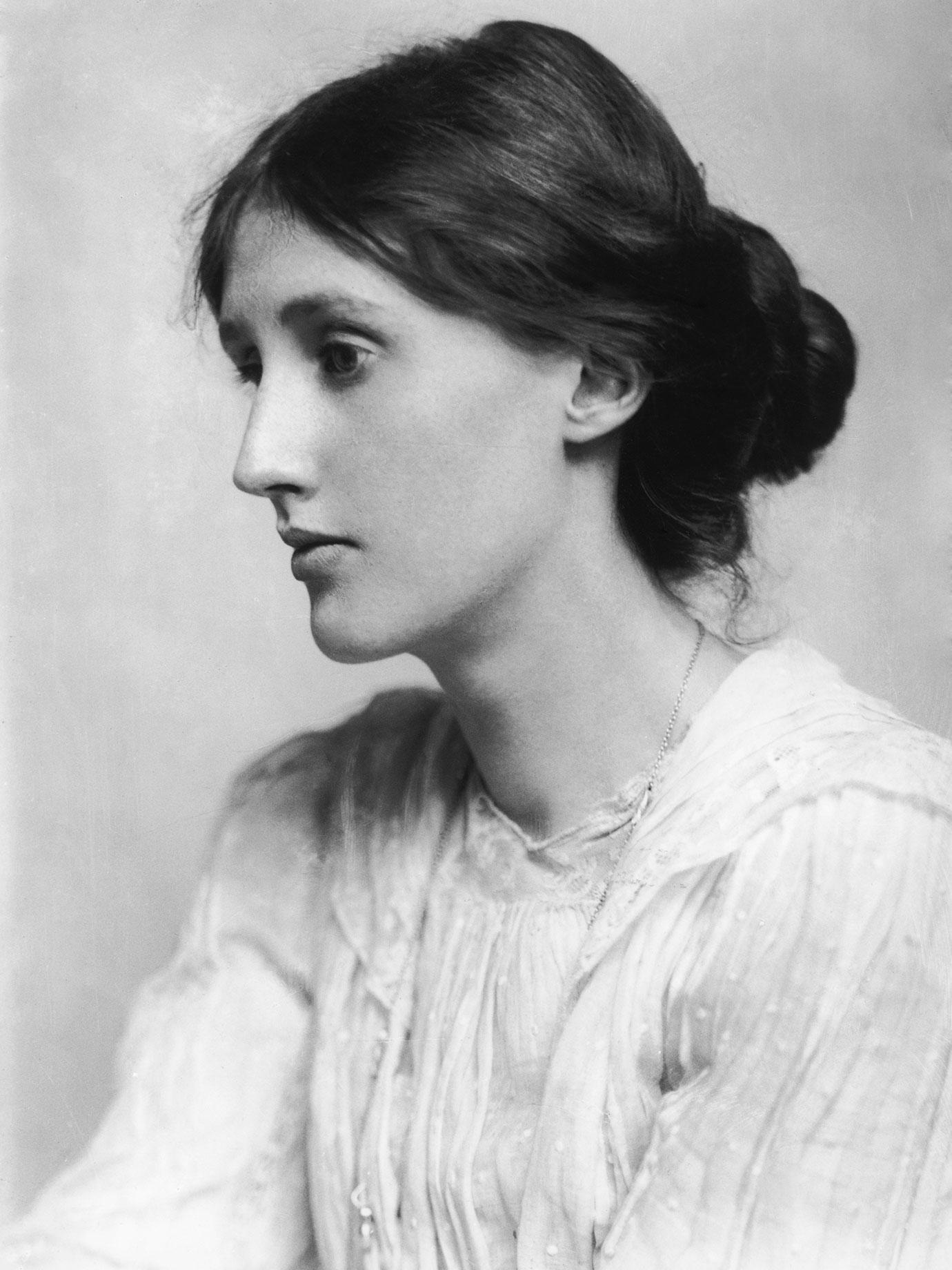 A lady in Victorian dress.