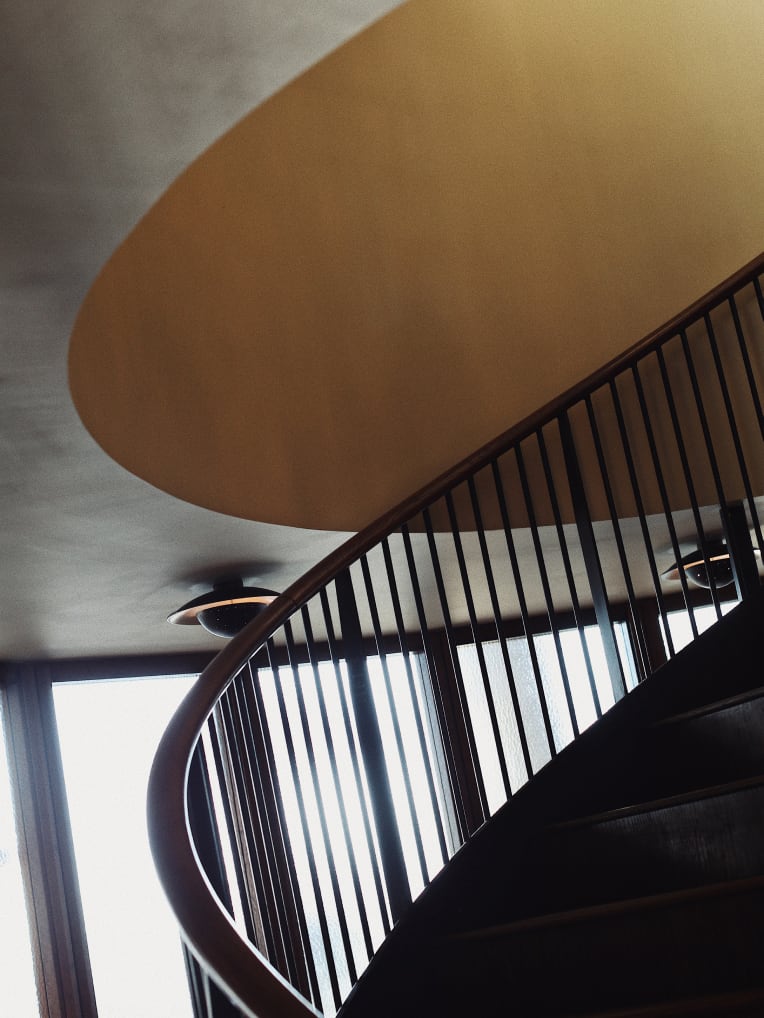 A spiral staircase stairwell.