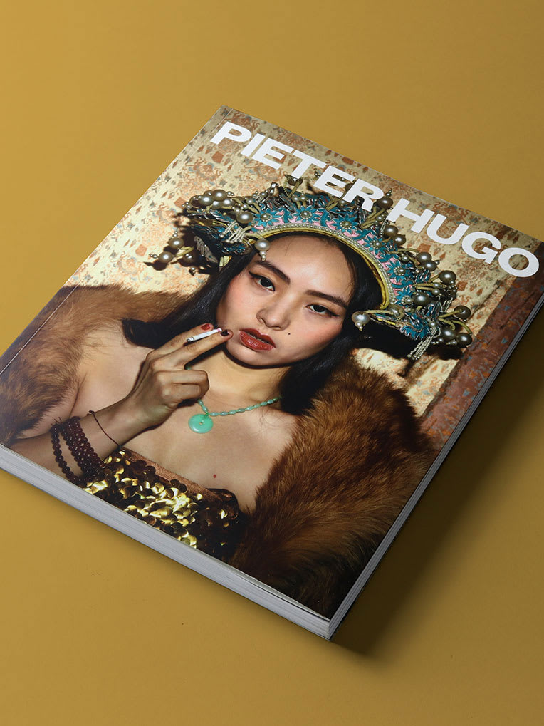 A photography book with a model on the cover.