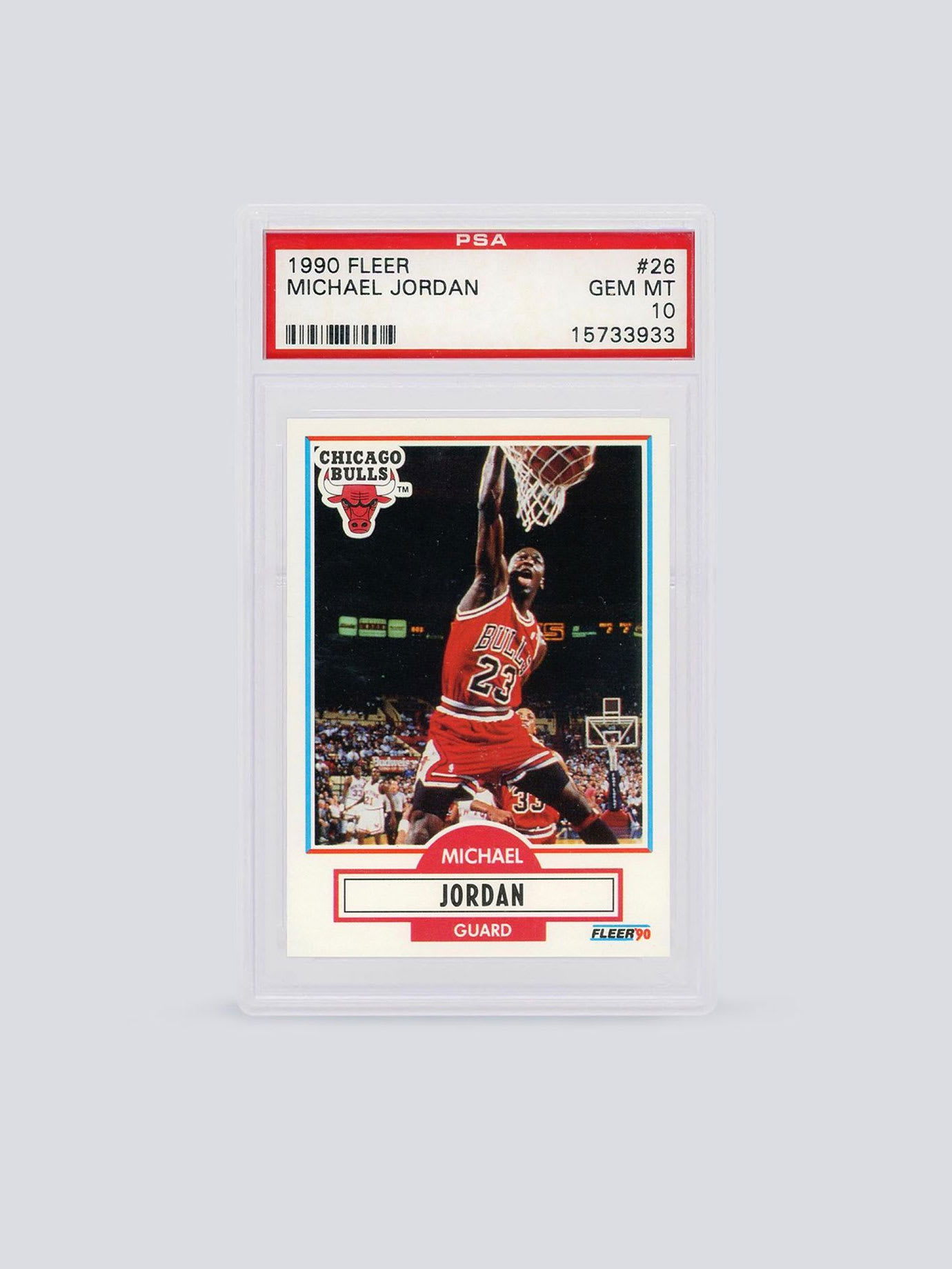 A picture on a grey background of a basketball player dunking a ball.