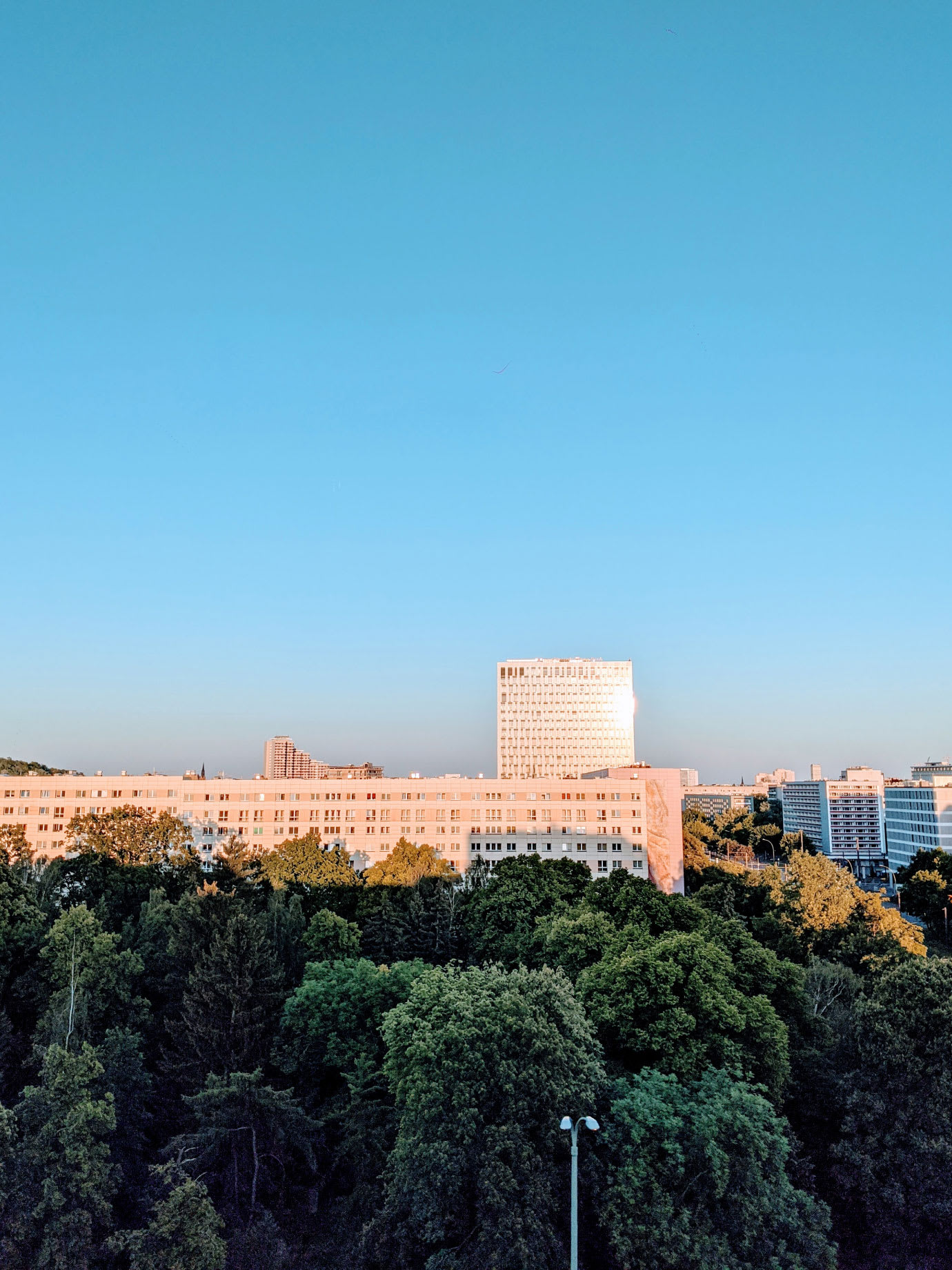 A view over a city on a sunny day.