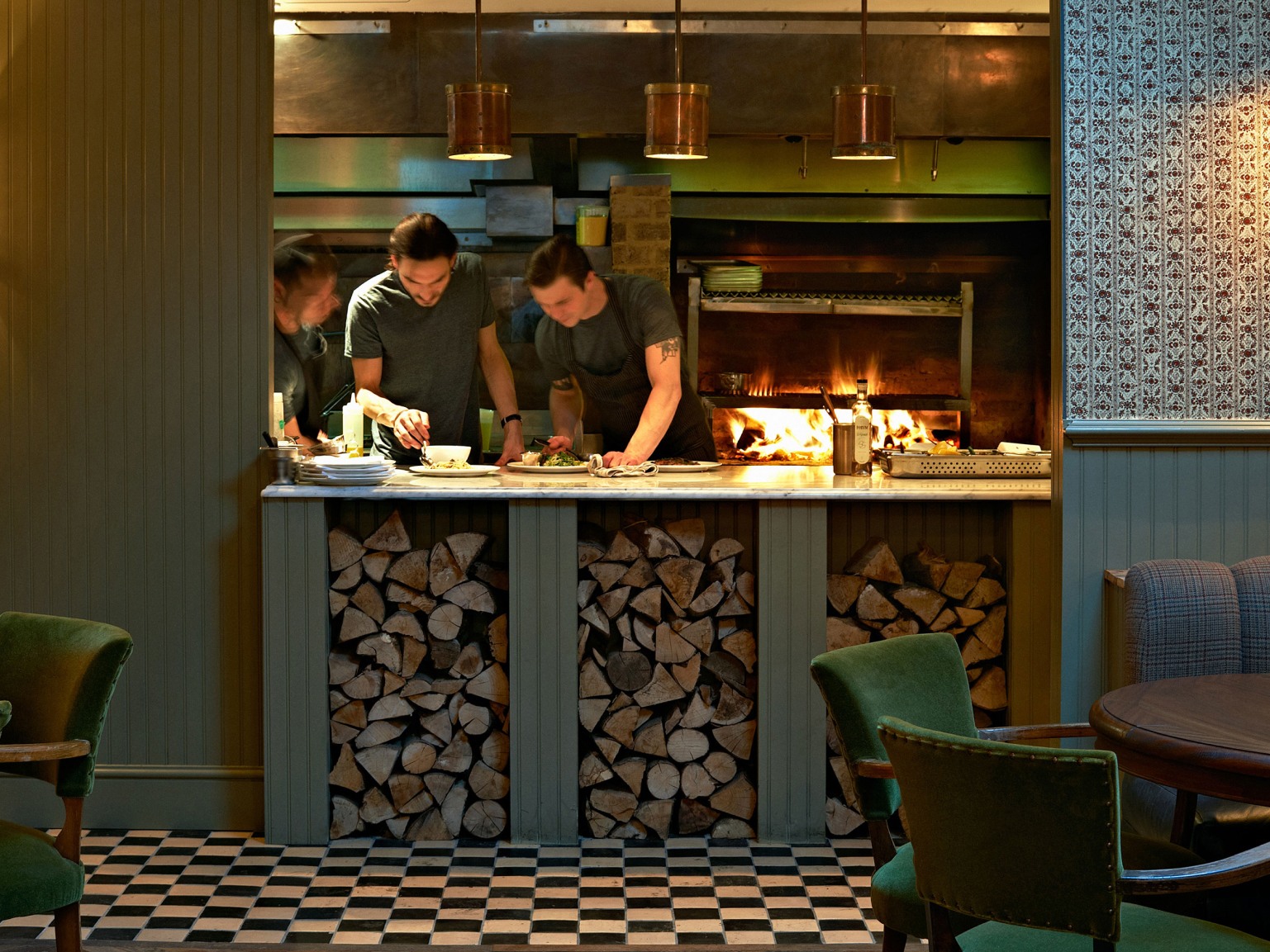 Chefs working in a kitchen.