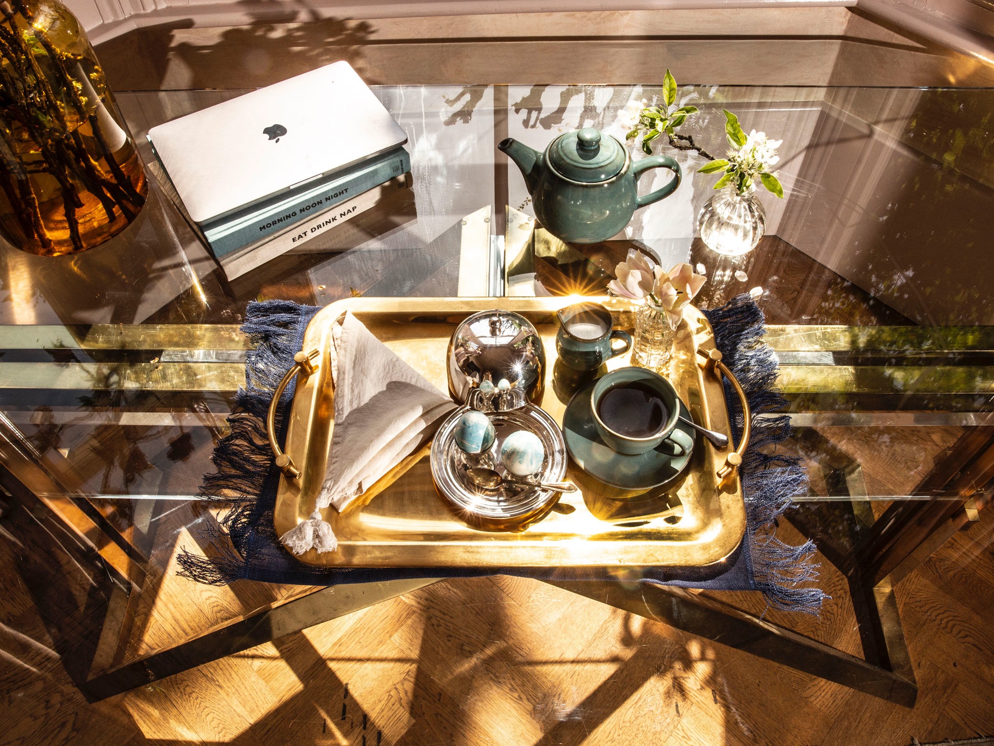 A tray with various tea implements on it.