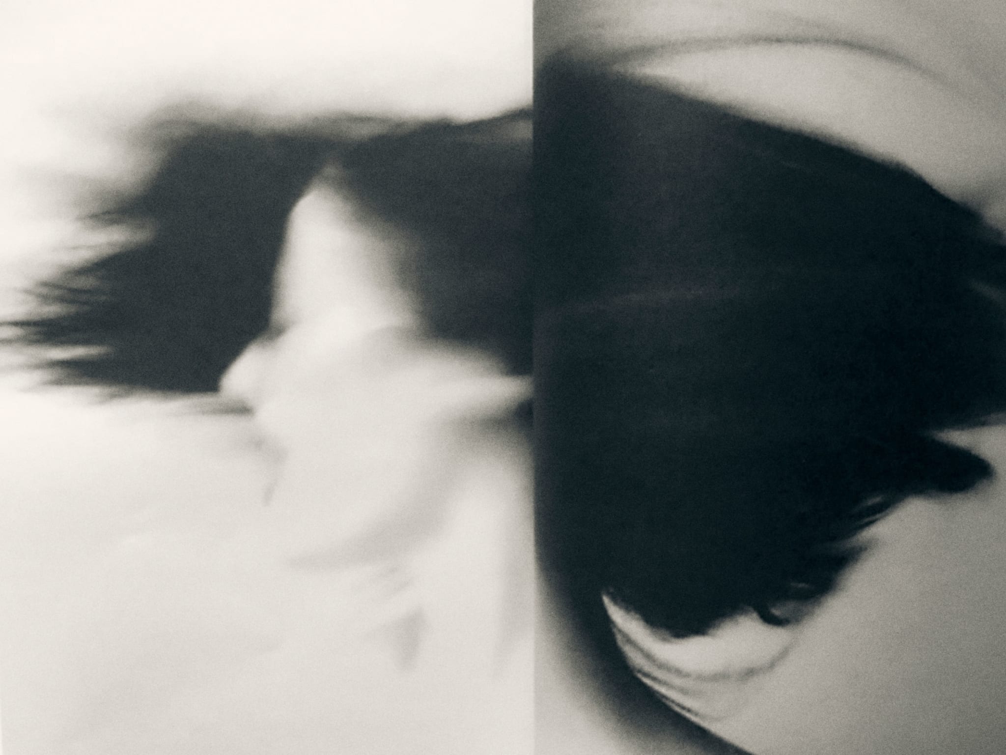 A woman shaking her head.