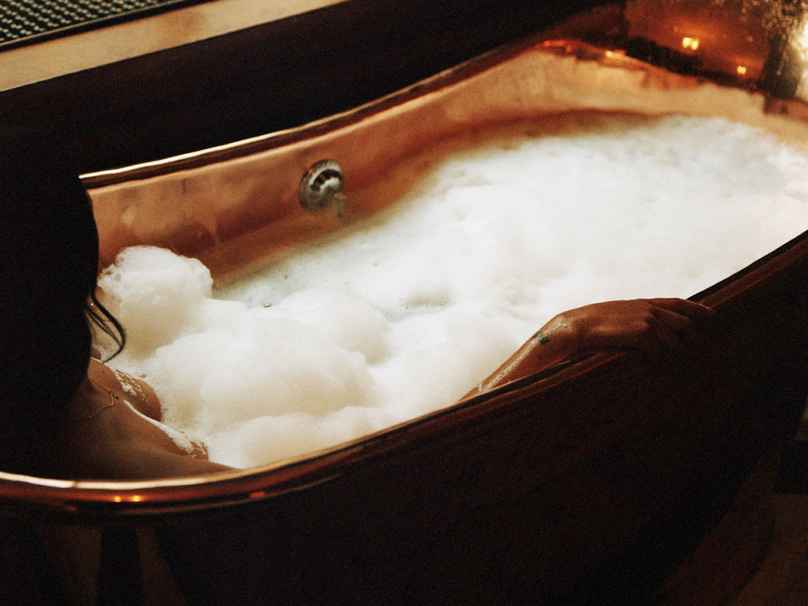 A woman in a bath.