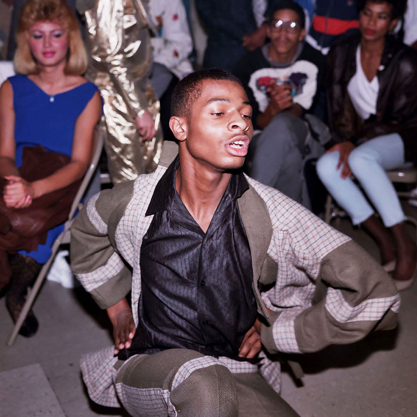 A man dancing for an audience.