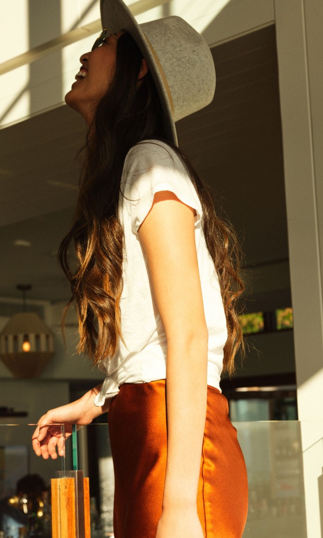 A young woman laughing.