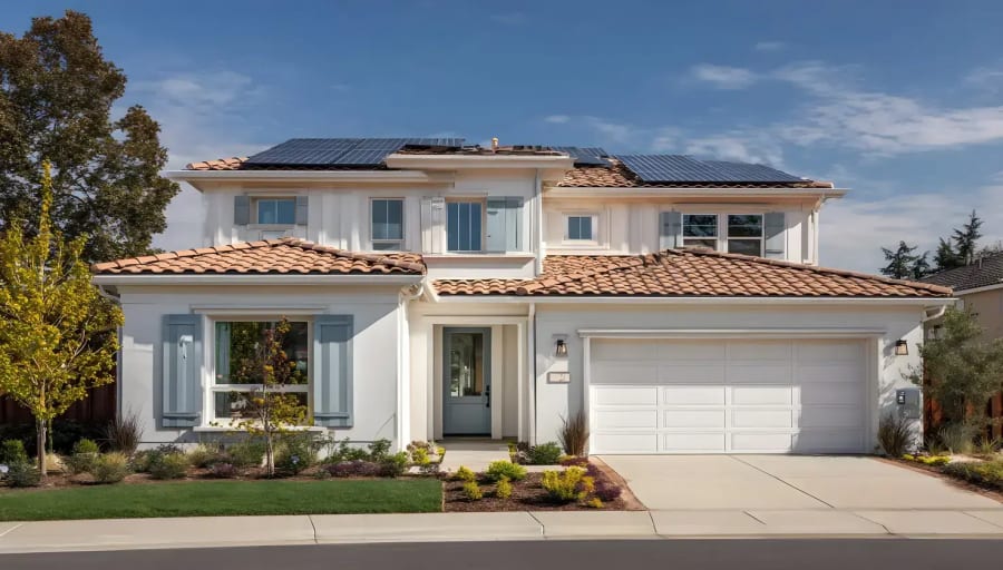 Two-story home in San Jose with solar panels, stucco exterior, and a two-car garage