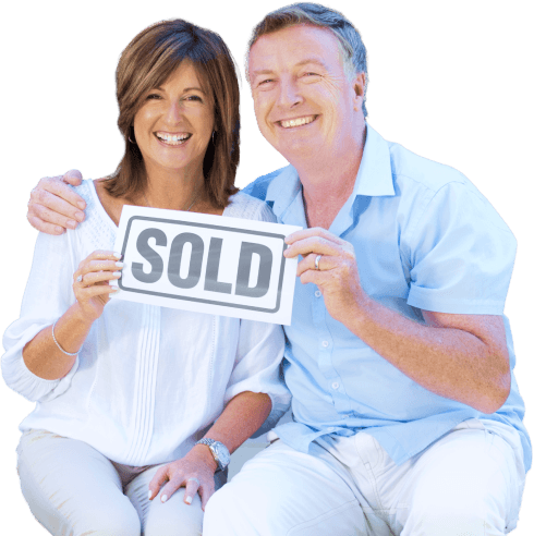 Husband and wife smiling after selling their house for top dollar with a SoldNest agent