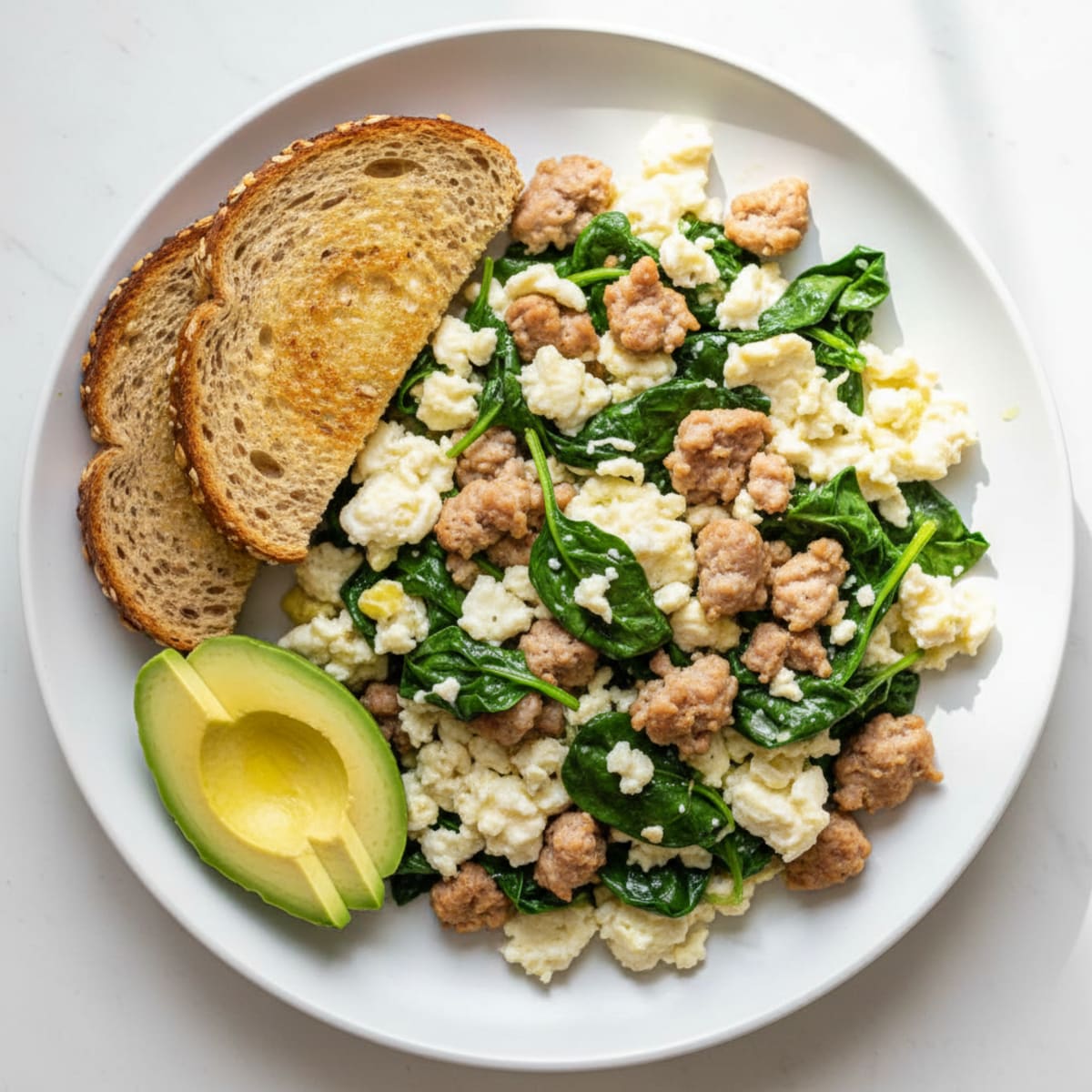 Egg White and Turkey Sausage Scramble with Sautéed Spinach