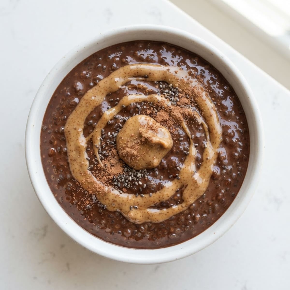 Chocolate Protein Pudding with Almond Butter and Chia Seeds
