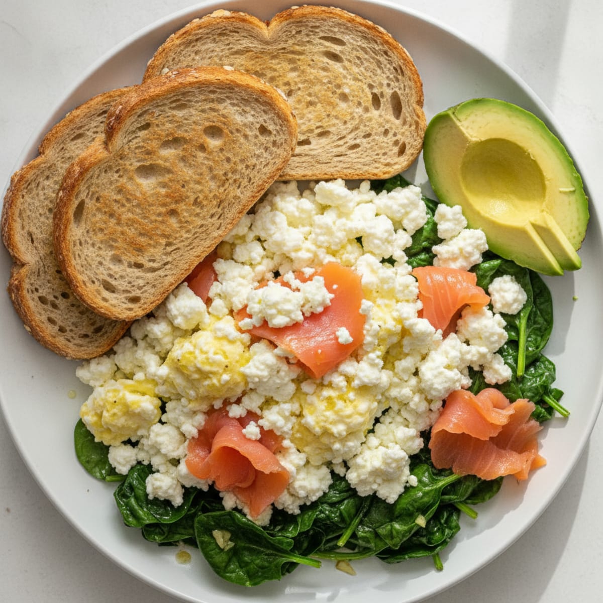 Cottage Cheese Egg White Scramble with Smoked Salmon and Sautéed Spinach