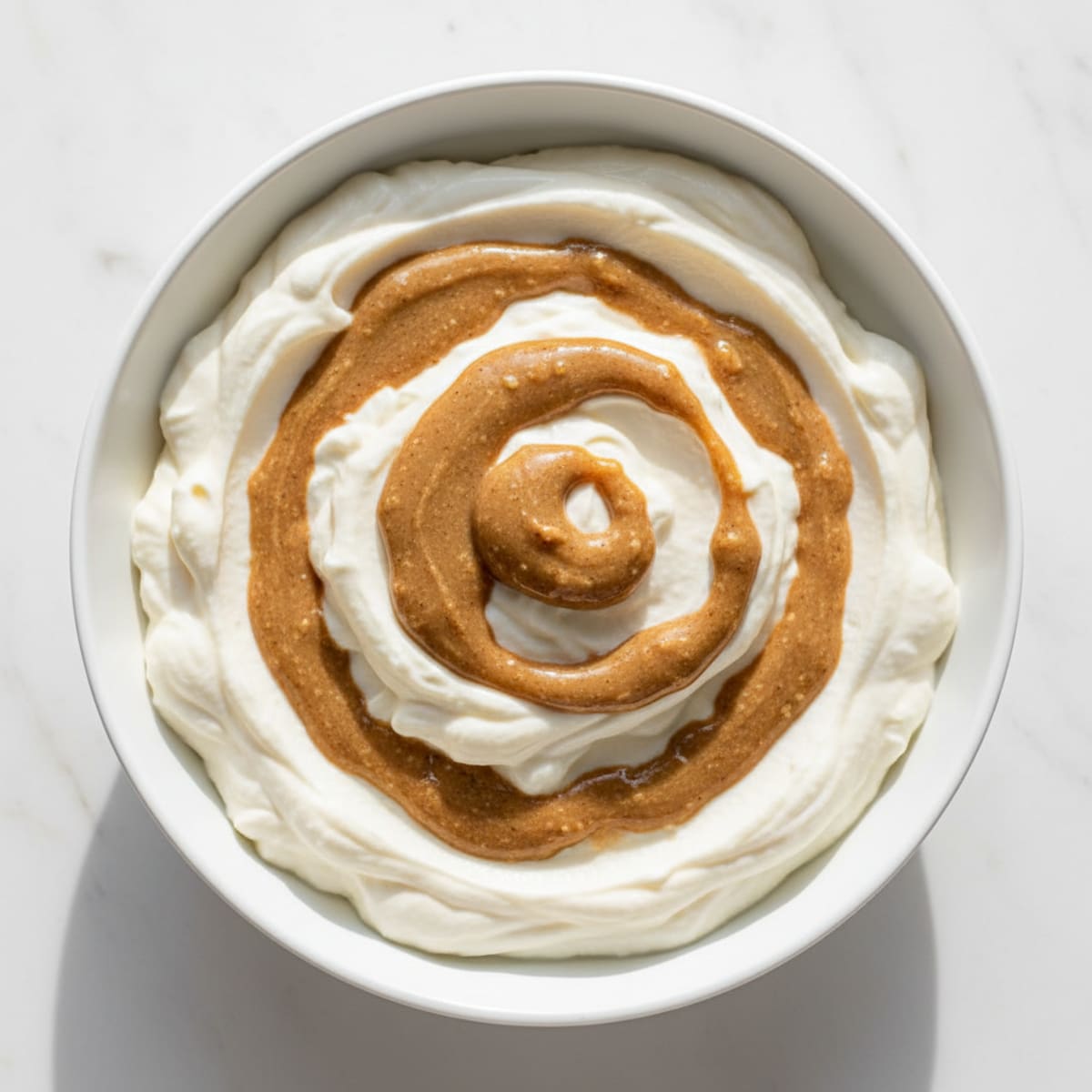 Silky Vanilla Protein Yogurt with Almond Butter Swirl