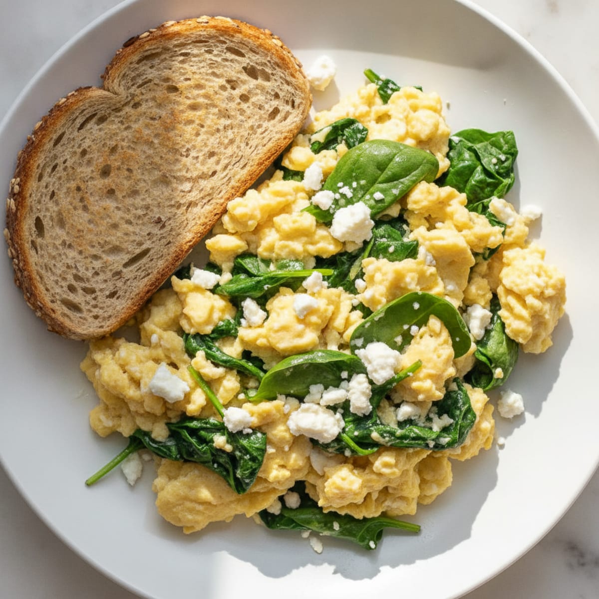 Cheesy Egg and Spinach Scramble