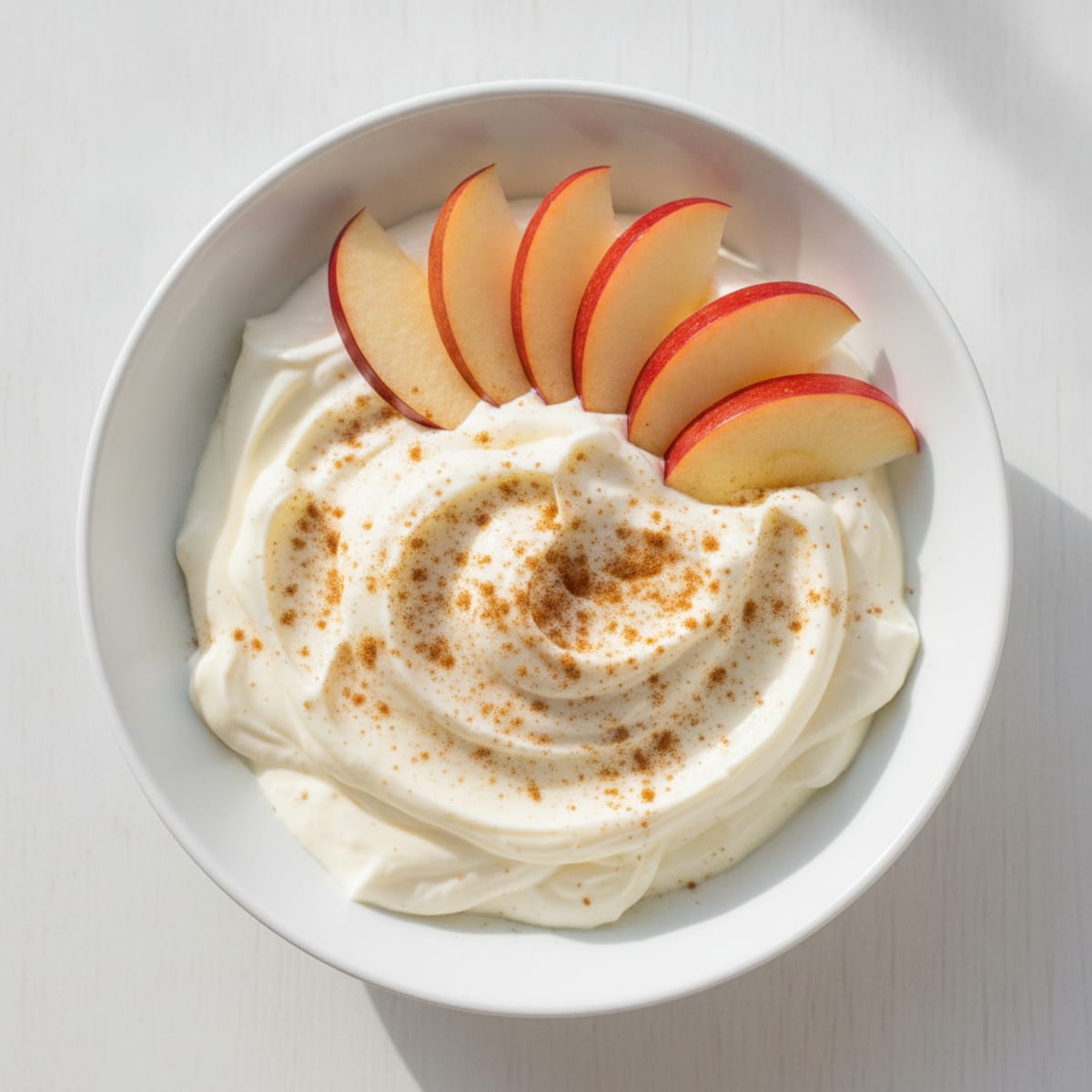 Creamy Vanilla Protein Yogurt with Sliced Apples