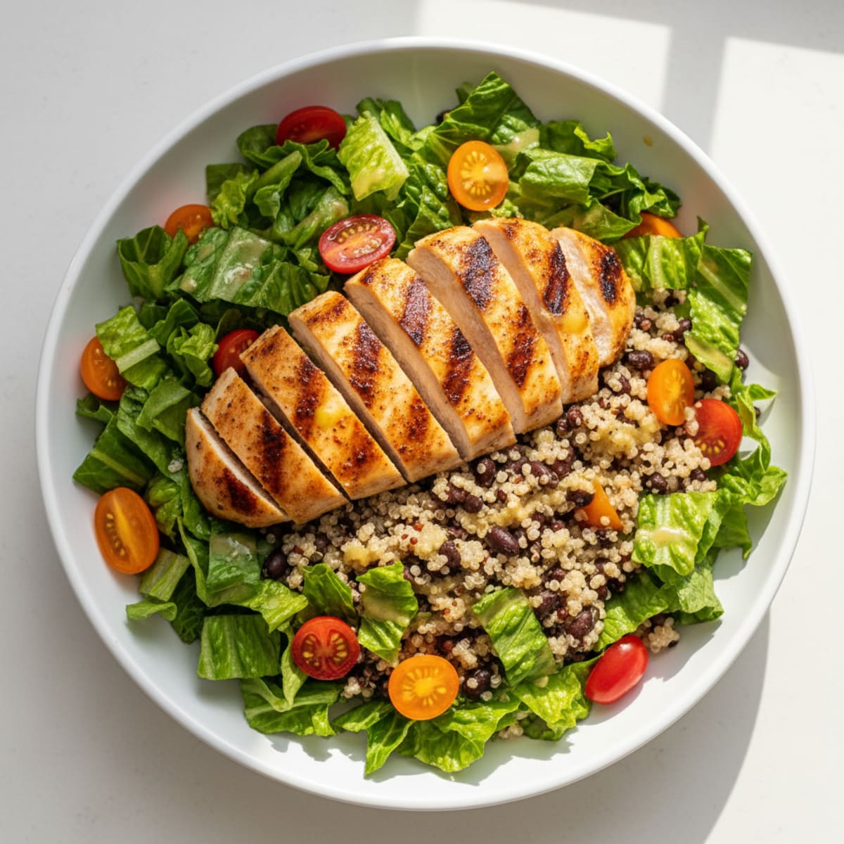 Grilled Chicken and Quinoa Bowl with Crunchy Romaine and Tomato