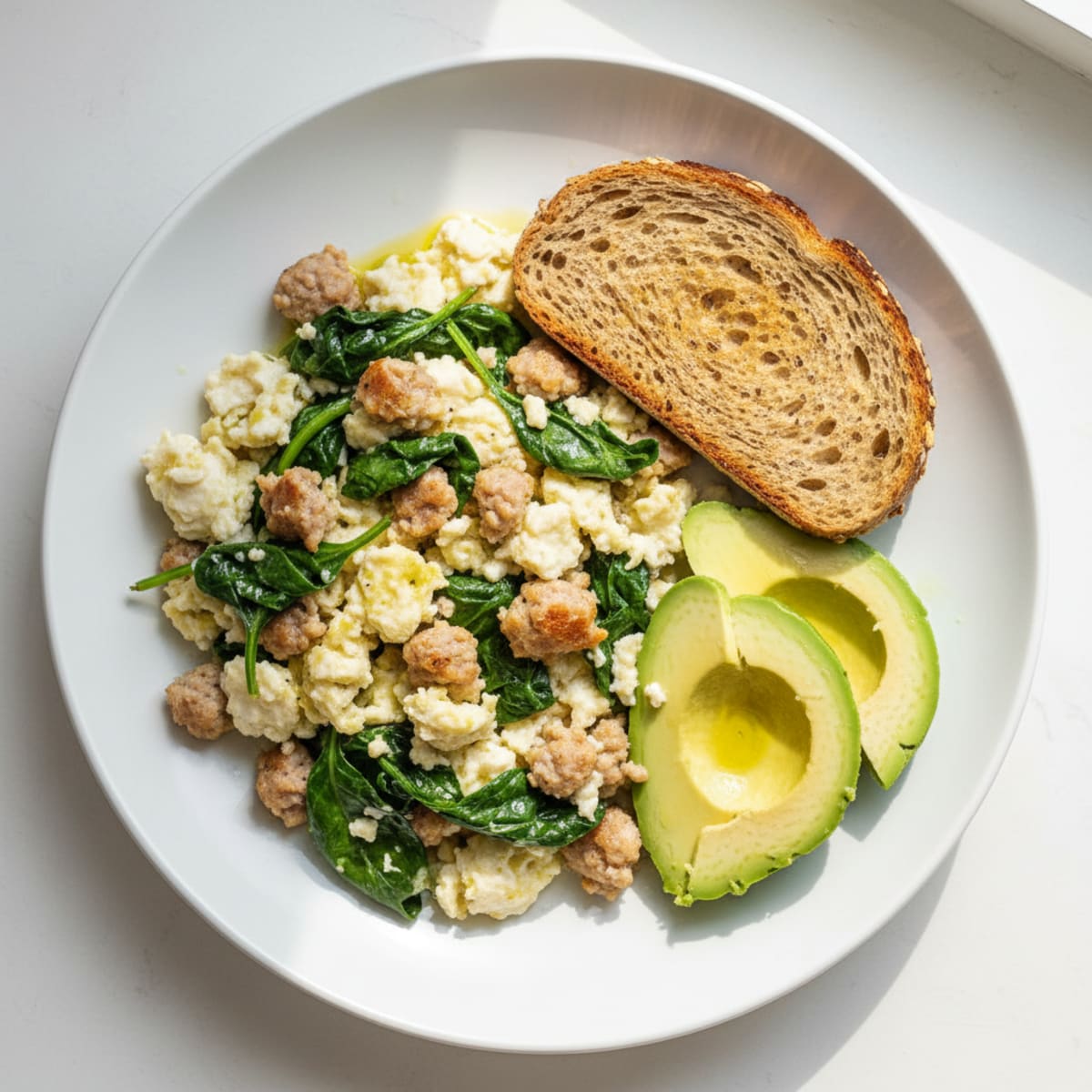 Egg White and Turkey Sausage Scramble with Sautéed Spinach