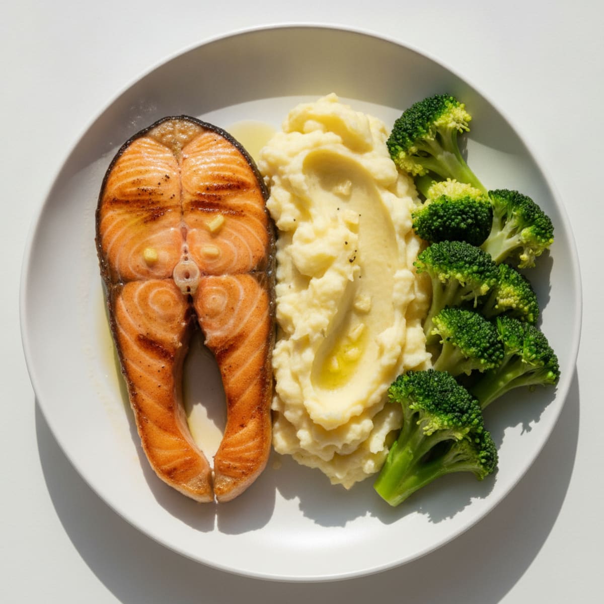 Pan-Seared Salmon with Steamed Broccoli and Garlic Mashed Potatoes