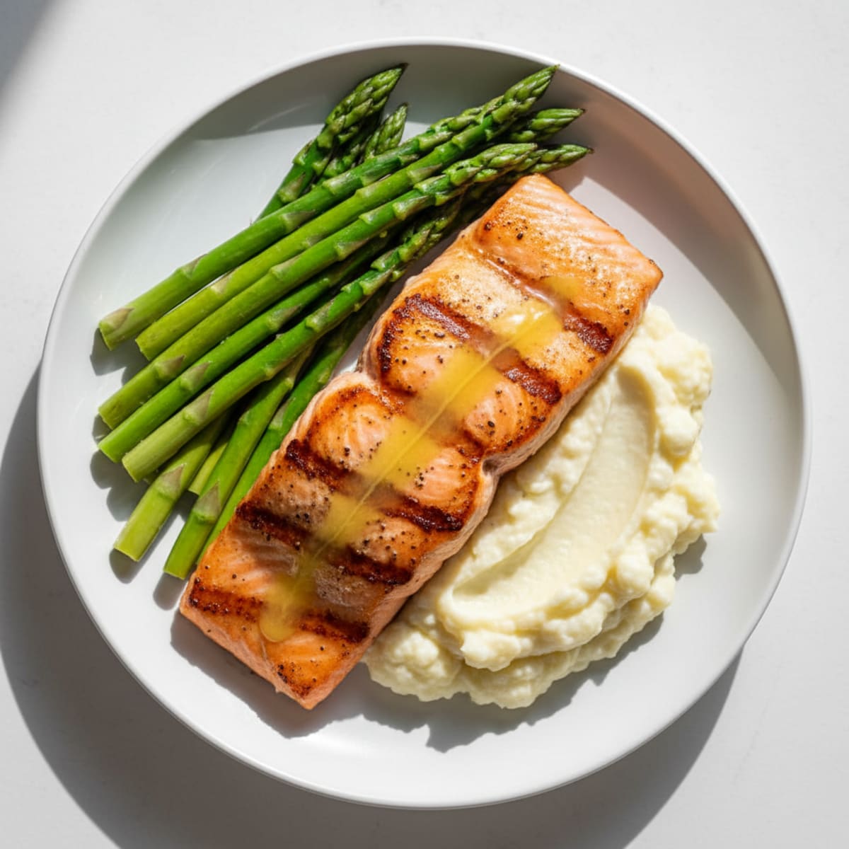 Seared Salmon Filet with Steamed Asparagus and Garlic Mashed Cauliflower
