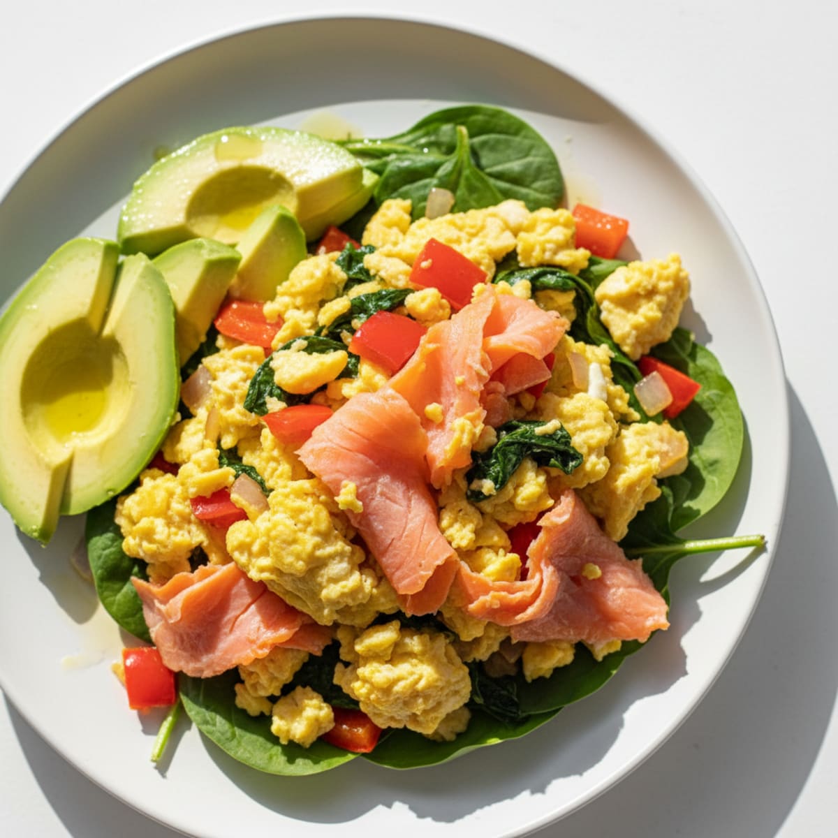 Smoked Salmon and Egg Veggie Scramble with Sautéed Spinach