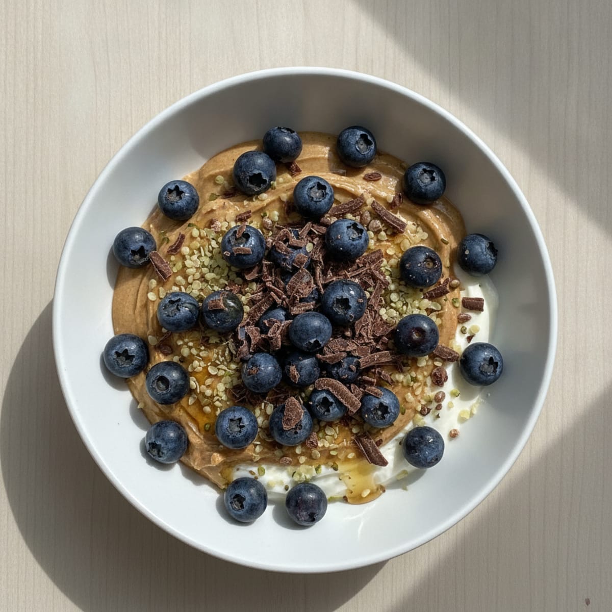 Protein Skyr Bowl with Nut Butter and Dark Chocolate Shavings