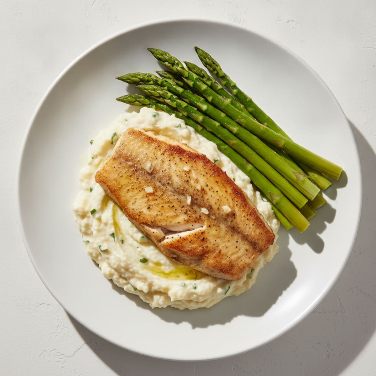 Seared Tilapia with Steamed Asparagus and Garlic Cauliflower Mash