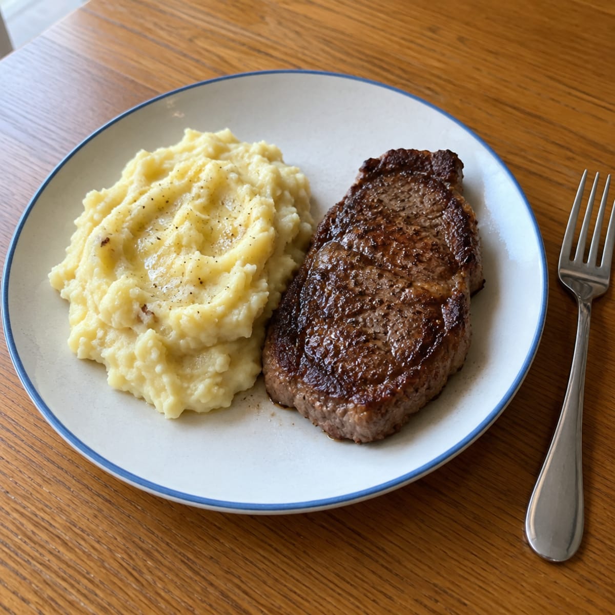 Garlic mashed potatoes and steak