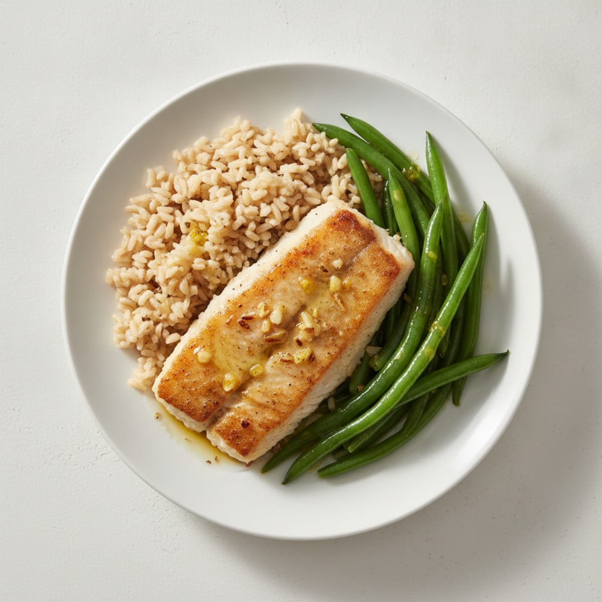 Seared Lemon-Garlic Tilapia with Steamed Green Beans and Brown Rice