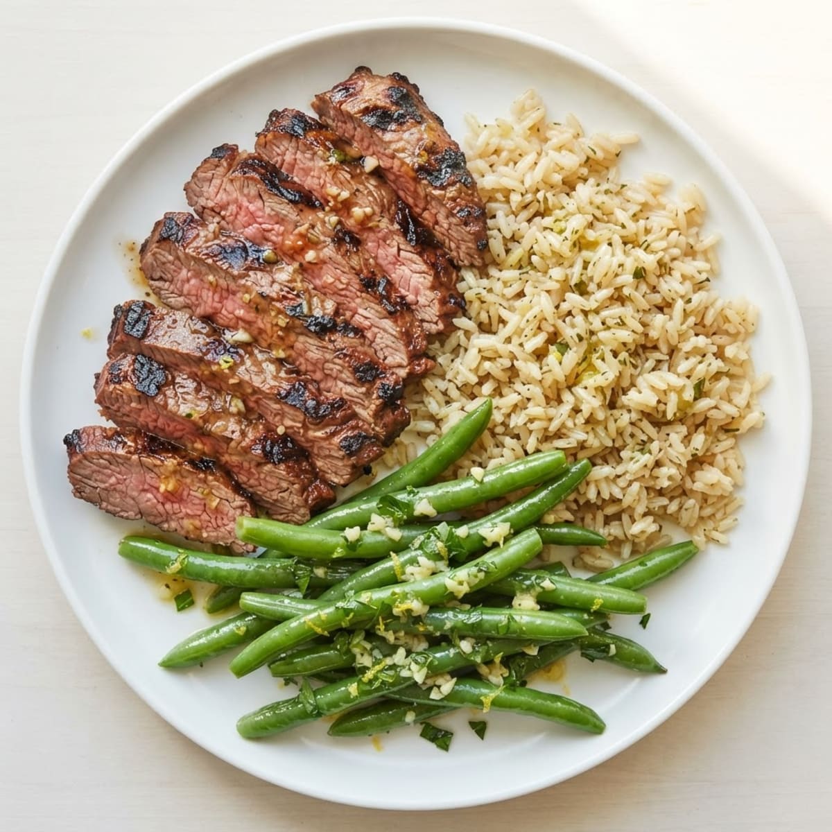 Grilled Steak with Lemon-Garlic Green Beans and Brown Rice