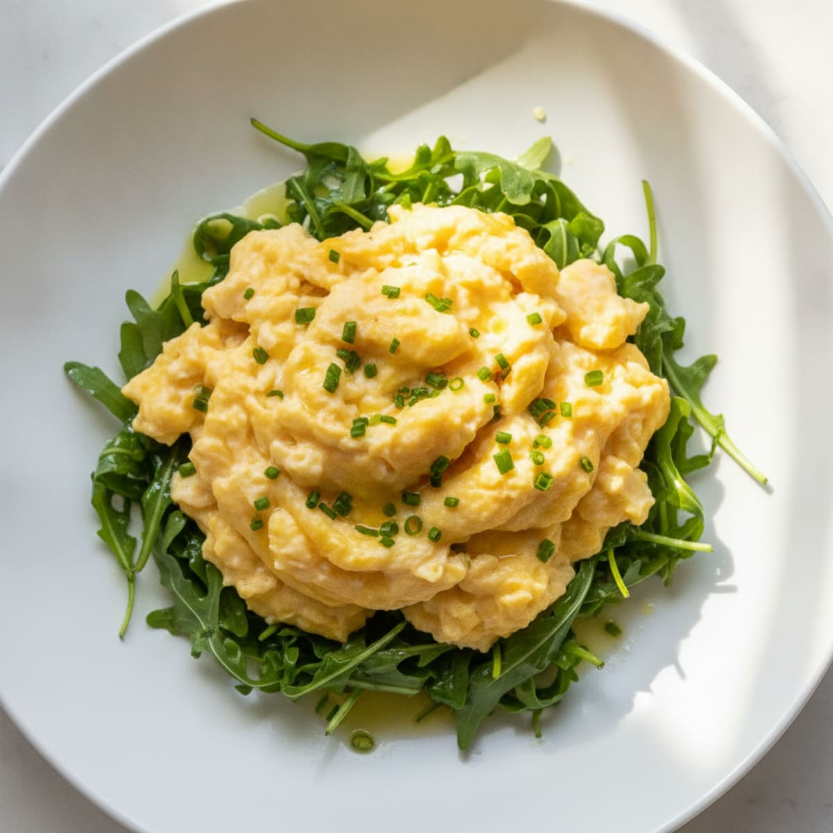 Herb Scrambled Eggs with Sautéed Rocket