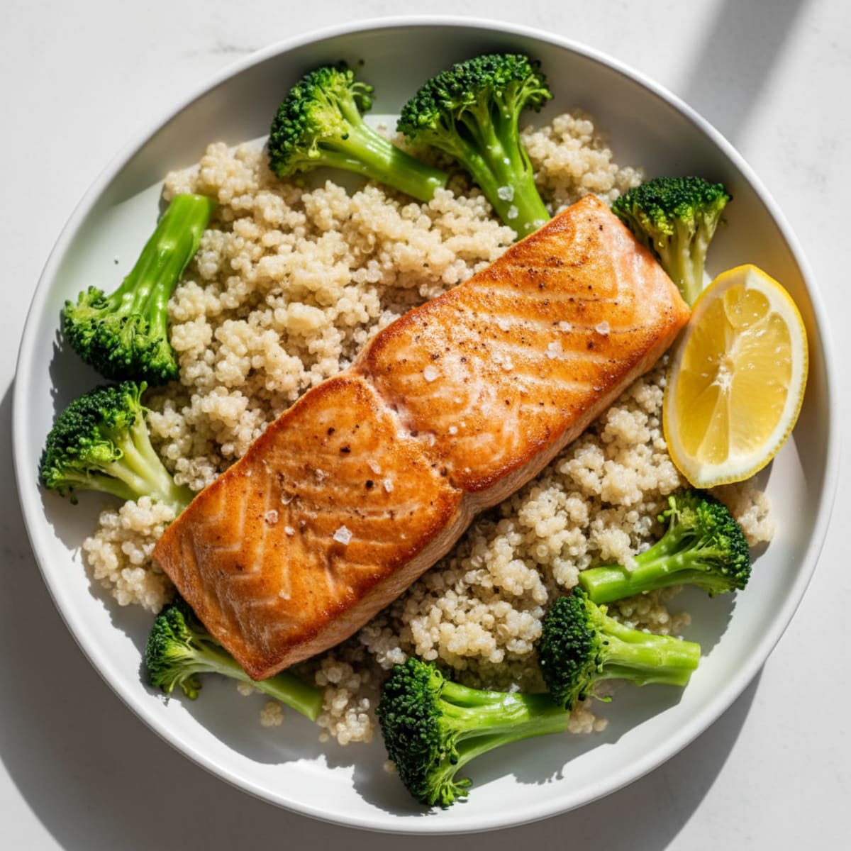 Seared Salmon Filet with Steamed Broccoli and Quinoa