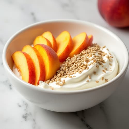 Creamy Cottage Cheese Bowl with Hemp Seeds and Sliced Peaches
