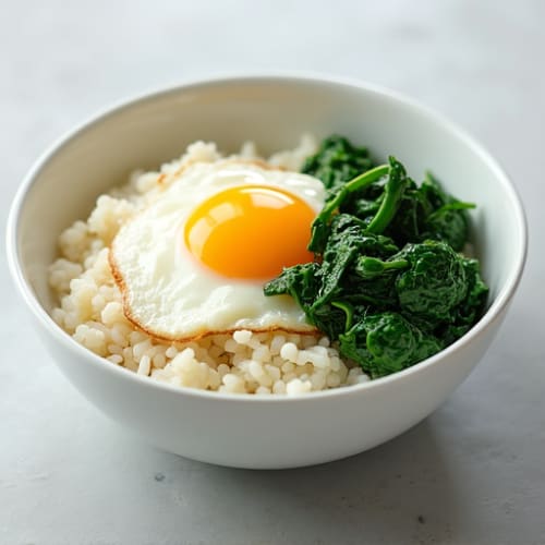 Egg and Cottage Cheese Rice Bowl with Sautéed Spinach