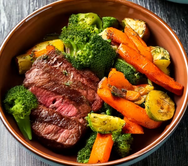 program transformation testimonial image from Steak & Roasted Veggie Bowls
