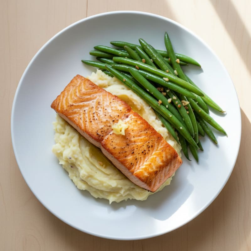 Seared Salmon Fillet with Garlic Mashed Potatoes and Sautéed Green Beans
