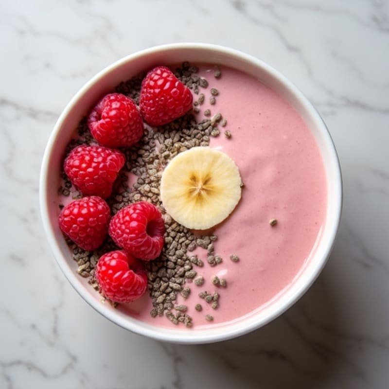 Creamy Vanilla Protein Smoothie Bowl with Fresh Raspberries
