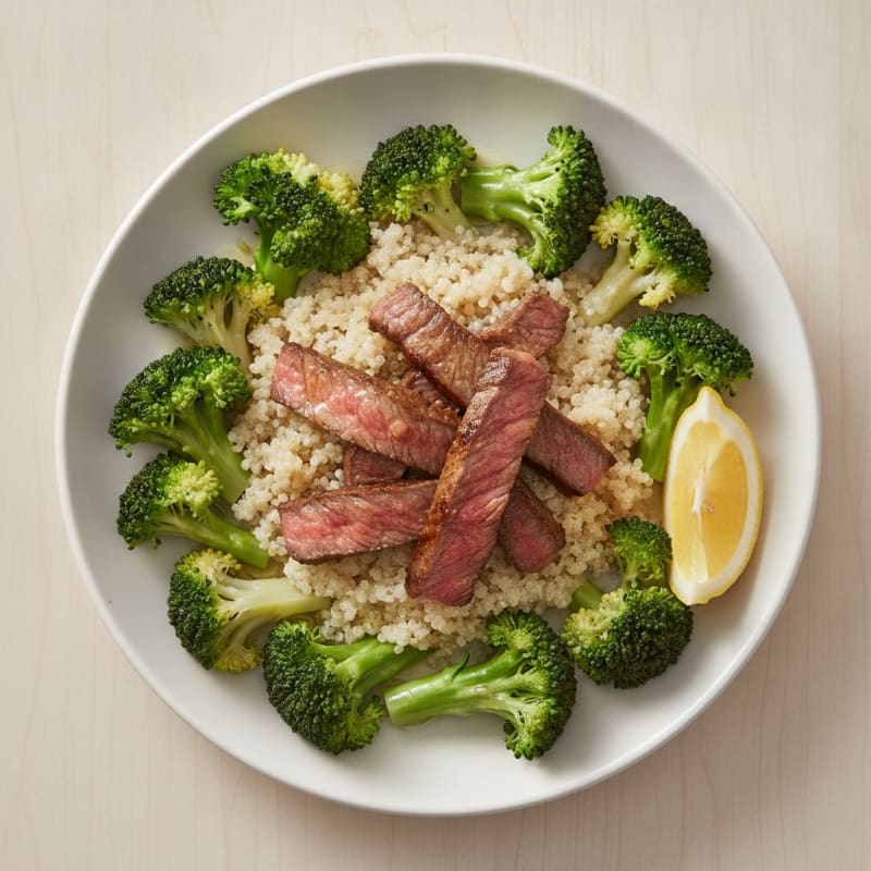 Seared Lean Beef Strips with Steamed Broccoli and Quinoa