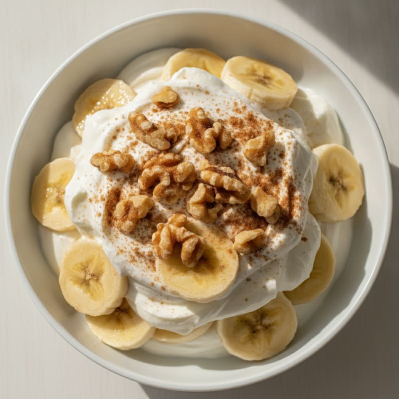 Protein Yogurt Parfait with Sliced Bananas and Whey Protein