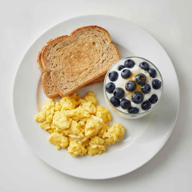 Scrambled Eggs with Wheat Toast and Greek Yogurt Parfait