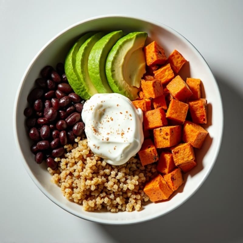Spicy Black Bean Quinoa Bowl with Roasted Sweet Potato