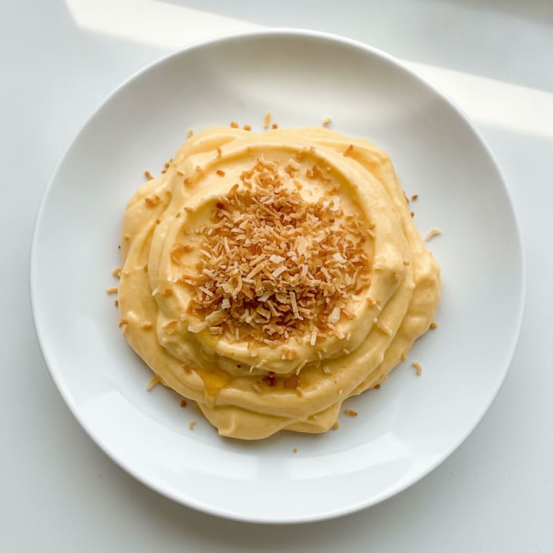 Silky Protein Mango Mousse with Toasted Coconut