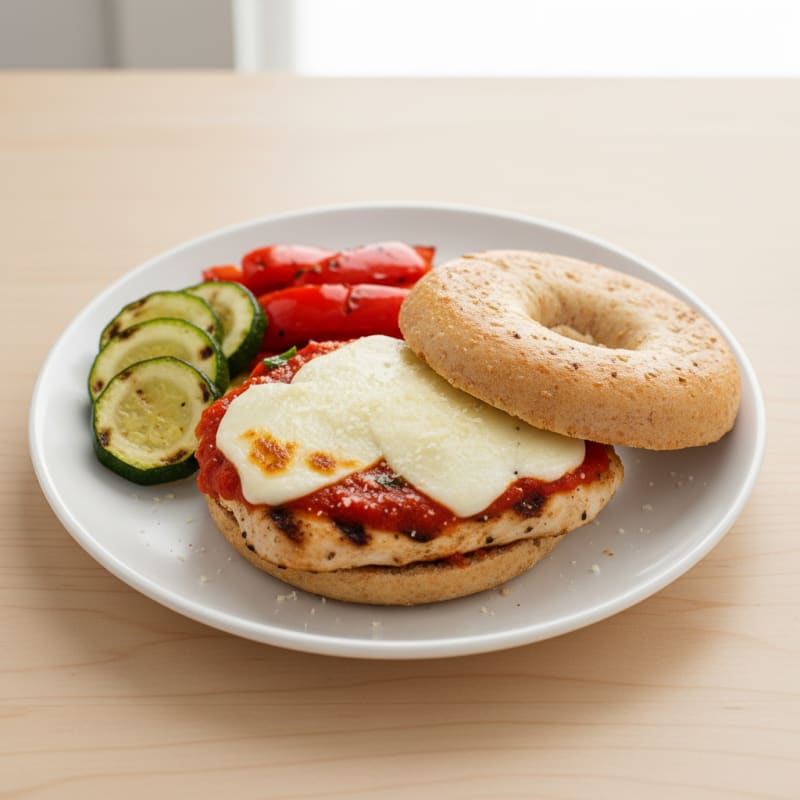 Grilled Chicken Parmesan Bagel Sandwich with Roasted Vegetables