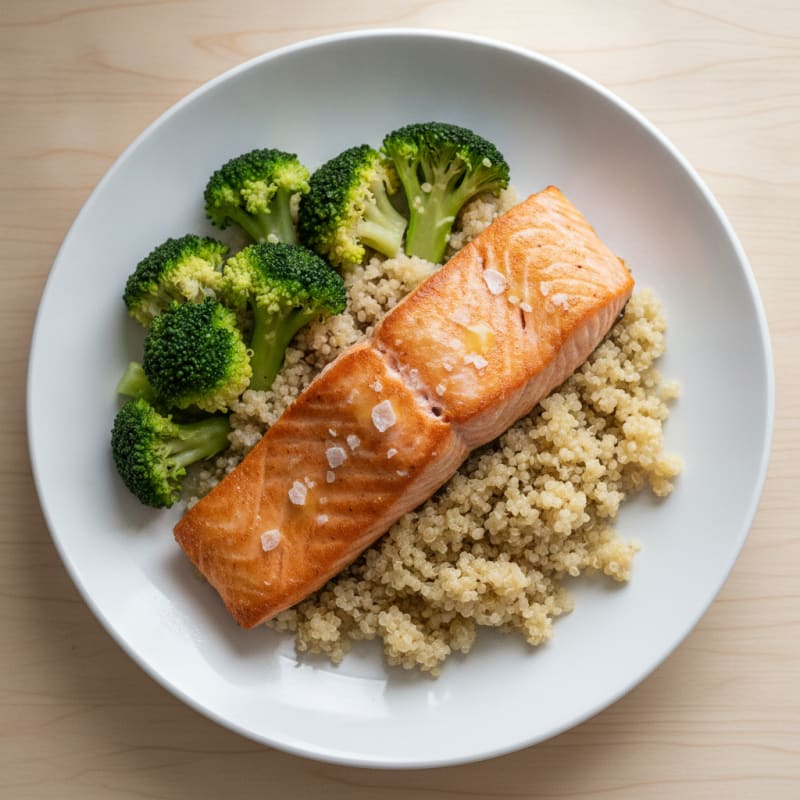 Seared Salmon Fillet with Steamed Broccoli and Quinoa