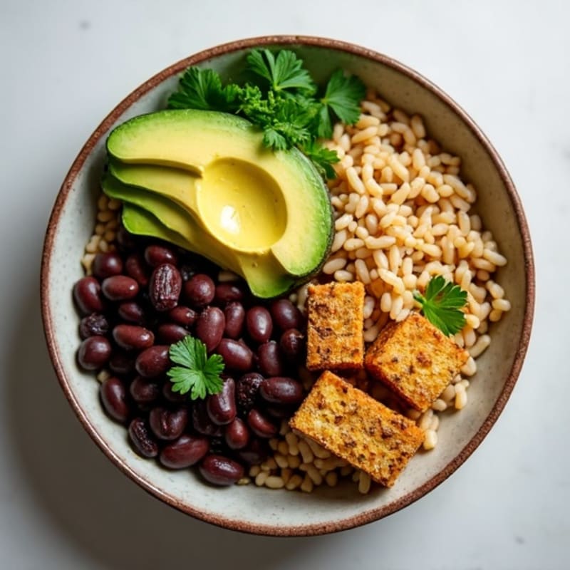 Hearty Black Beans and Brown Rice Bowl with Fresh Herbs and Creamy Avocado