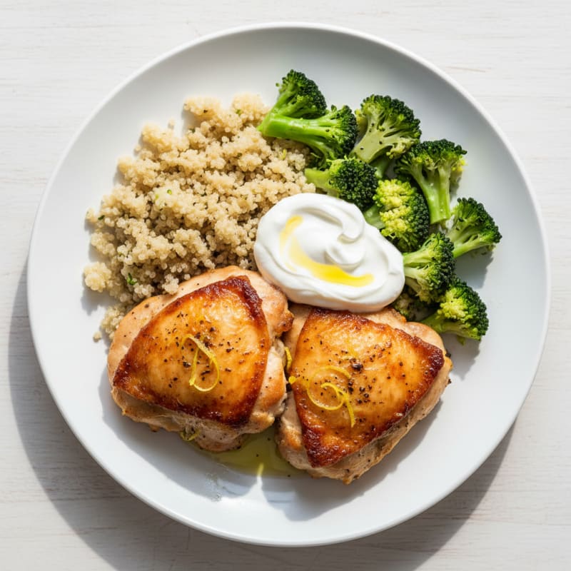 Roasted Chicken Thighs with Steamed Broccoli and Quinoa