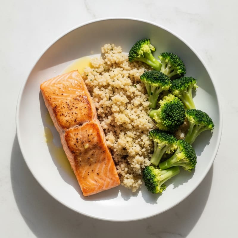 Seared Salmon Fillet with Steamed Broccoli and Quinoa