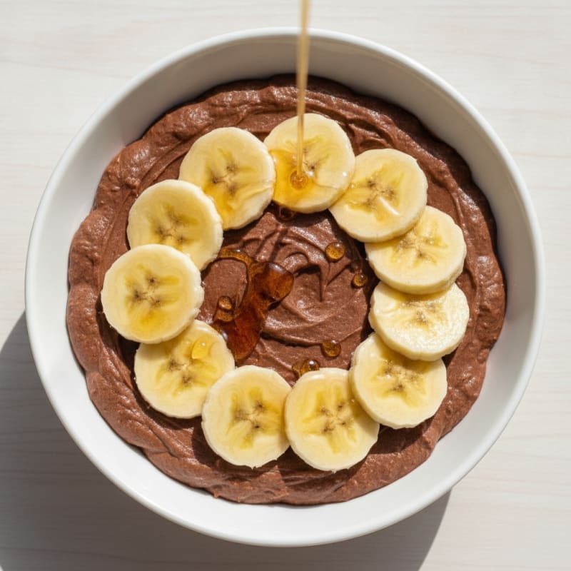 Chocolate Protein Pudding with Sliced Banana