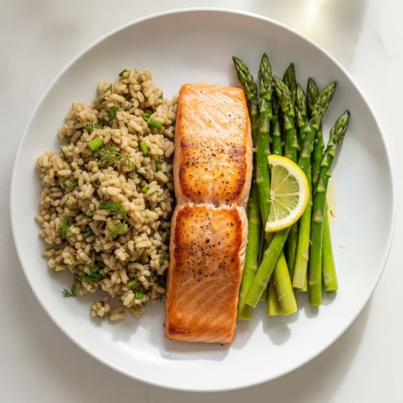 Seared Salmon Fillet with Steamed Asparagus and Herbed Brown Rice