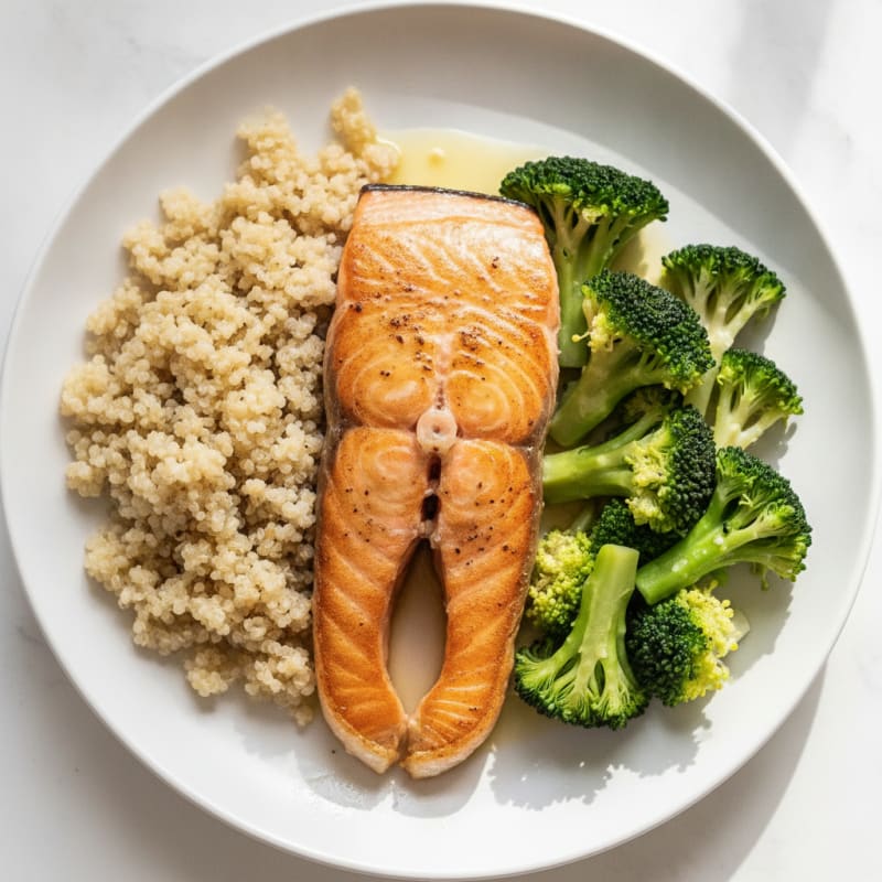 Seared Salmon Fillet with Steamed Broccoli and Quinoa